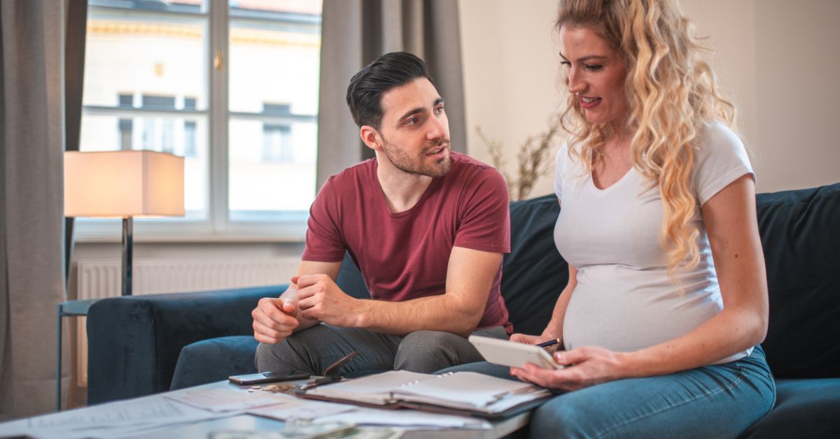 Young couple looking over estate plan